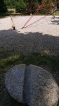 Druhý z kamenů, označující 18. poledník vých. délky v Panské zahradě ve Vsetíně